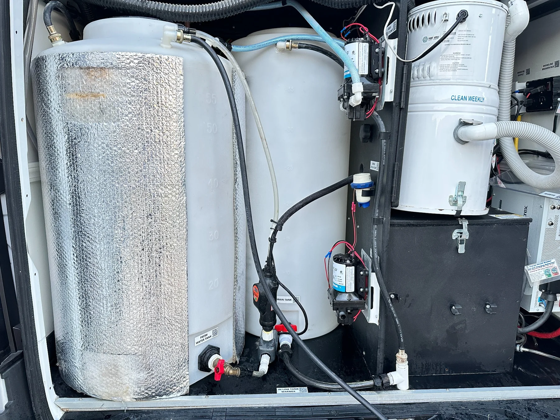 Rear utility area of mobile pet styling van after deep cleaning