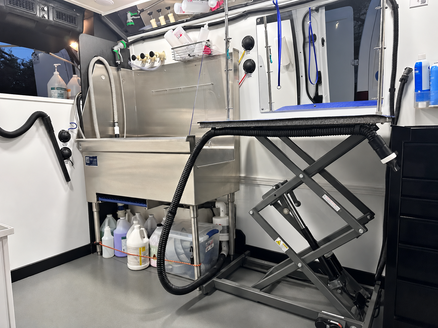 Clean and organized mobile pet styling van interior